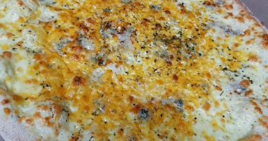 Пицца «Четыре сыра»